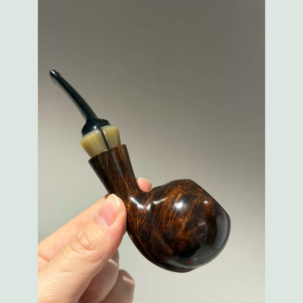 Large Dragon Claw Egg Bent Solid Briar Wood Tobacco Pipe supporting product view